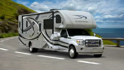 RV driving down coastal road